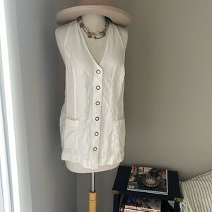 Free people! never worn with tags. Size large but adjustable with back tie